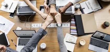 Colleagues giving a fist bump